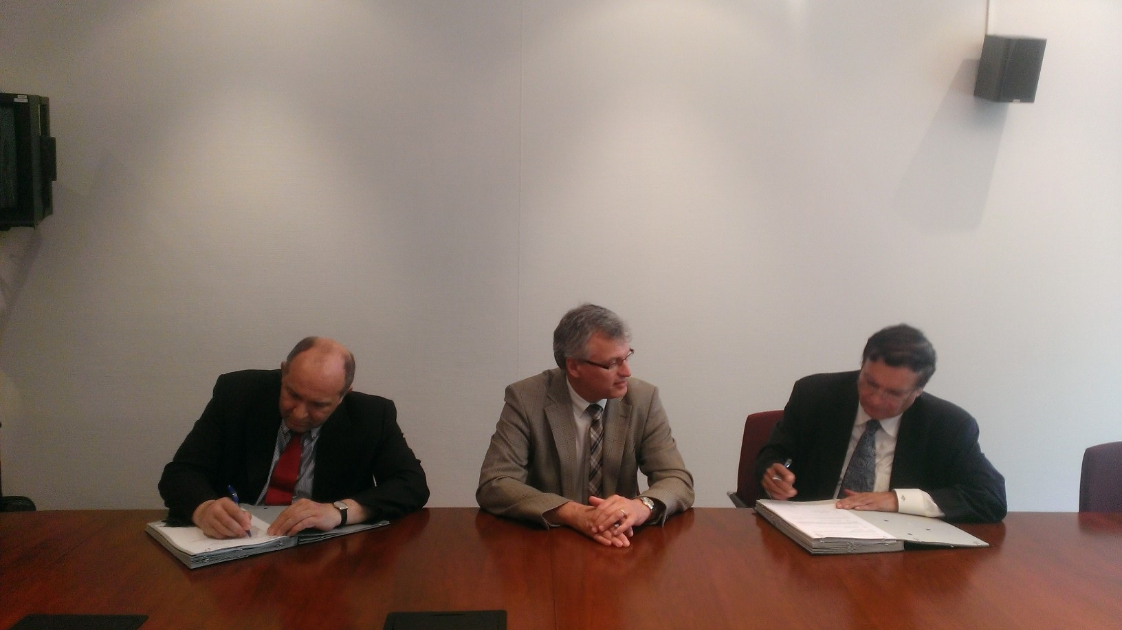 (from left to right) Mr. Robert Leclere, Synatom Chief Executive Officer; Mr. Wim de Clercq, Synatom Chairman; and Dr. Kris Singh, Holtec President and CEO, during the June 7th contract signing in Brussels